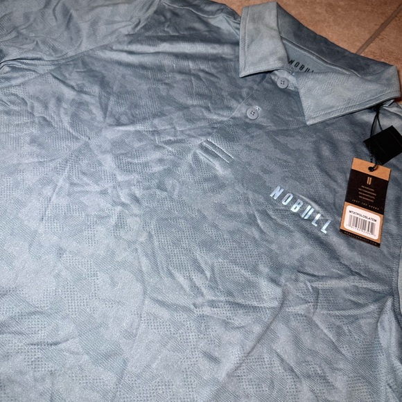 *NWT* NOBULL Men's Light Blue Camo Polo Shirt - Picture 3 of 6